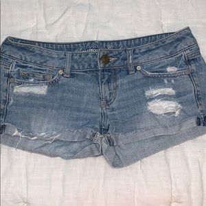 Light washed, distressed, jean shorts.